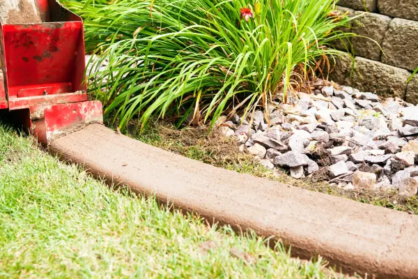 Concrete Curbing vs Plastic Edging